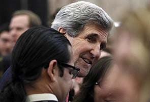 John Kerry makes surpise visit to Iraq to press for Syria cooperation