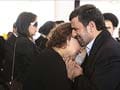Mahmoud Ahmadinejad under fire for hugging Hugo Chavez's mother