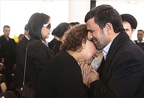 Mahmoud Ahmadinejad under fire for hugging Hugo Chavez's mother