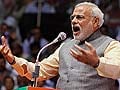 Narendra Modi targets Gandhis, calls PM 'night watchman'