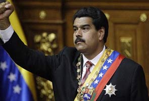 Venezuela's Nicolas Maduro urges Barack Obama to halt 'plot' against rival