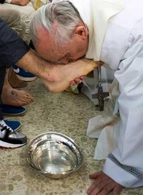 Pope Francis washes women's feet in break with church law