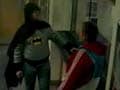 'Batman' hands suspect over to UK police