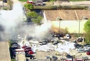 Small plane crashes in US parking lot; 3 dead