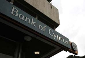 Cyprus details heavy losses for major bank customers