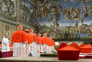 For cardinals at conclave, cigarette and a tipple to relieve papal tension