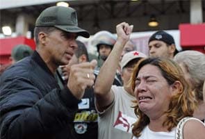 Hugo Chavez lies in state with open casket for farewell