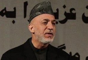 Afghan President Hamid Karzai may travel to Qatar to hold peace talks with Taliban leaders