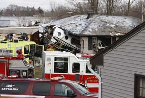 US: Small jet crashes into homes in Indiana, two killed