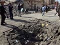 Iraq attacks kill 12, wound 165