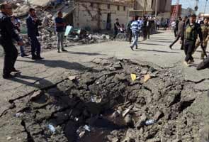 Iraq attacks kill 12, wound 165