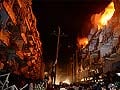 Karachi shuts down to bury 45 bomb dead