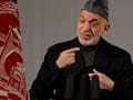 Hamid Karzai opponents open talks with Taliban, warlord