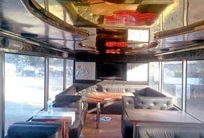 Enjoy a 12-course meal atop a double-decker bus