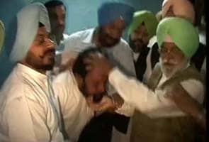 Woman beaten by Punjab cops tries to enter Punjab Assembly