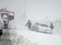 Unseasonable blizzards strand British motorists