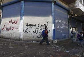 From teenage graffiti to a country in ruins: Syria's two years of rebellion