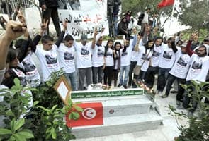 Tunisians mark 40 days since political killing of leader 	