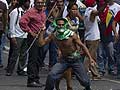Venezuelan police fire tear gas during clash ahead of vote
