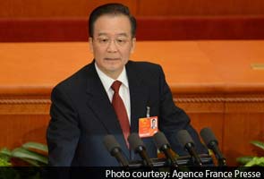 In defensive crouch, China leader voices regret