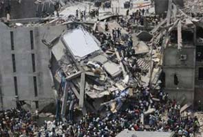 Bangladesh factory building collapse kills nearly 100