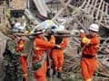 Rescuers struggle to reach China quake zone as toll climbs to 208