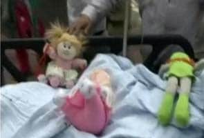 Blog: On Delhi 5-year-old's hospital bed, three dolls