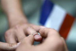 French Senate adopts gay marriage law