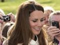 Two charged over intimate Kate photos