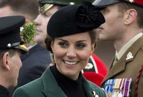 Two charged over intimate Kate photos