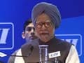 Slowdown is temporary, will prove Prophet of Doom wrong, PM Manmohan Singh tells India Inc