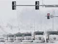 Spring storms unleash heavy snow, tornadoes in central US