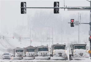 Spring storms unleash heavy snow, tornadoes in central US