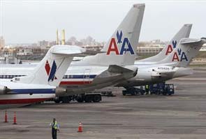 American Air says systems restored, expects more cancellations