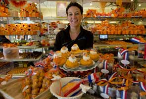 Amsterdam turns orange ahead of royal ceremony