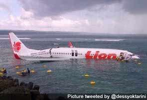 Plane misses Bali runway and lands in sea