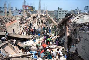 Bangladesh building collapse kills 82, hundreds injured