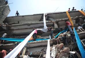 Bangladesh building collapse: 2 infants born under debris among rescued 