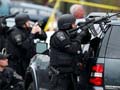 Boston bomb suspect hunt turns city into battle zone