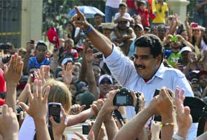 Hugo Chavez's successor Nicolas Maduro wins Venezuela's presidential election by thin margin