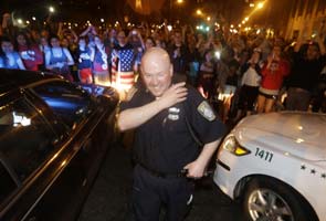 In suburban Boston, jubilation over capture