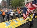 Thousands run final mile of Boston Marathon
