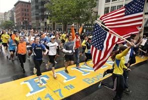 Thousands run final mile of Boston Marathon