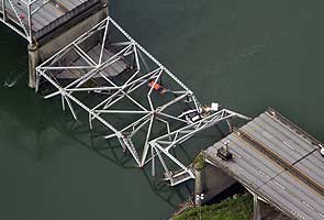 Truck crash may have caused Washington state bridge collapse