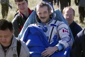 After tweeting from space, Canadian astronaut returns home