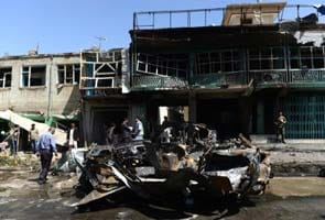 Kabul suicide bombing of NATO convoy kills 14 