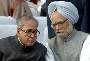 Prime Minister Manmohan Singh meets President Pranab Mukherjee in Delhi