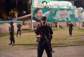 As Pakistan votes, the military watches sternly from its barracks