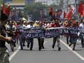 Around the world, angry workers unite on May Day
