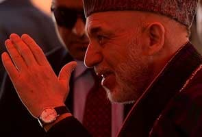 Afghanistan President Hamid Karzai in India; to meet Prime Minister Manmohan Singh today